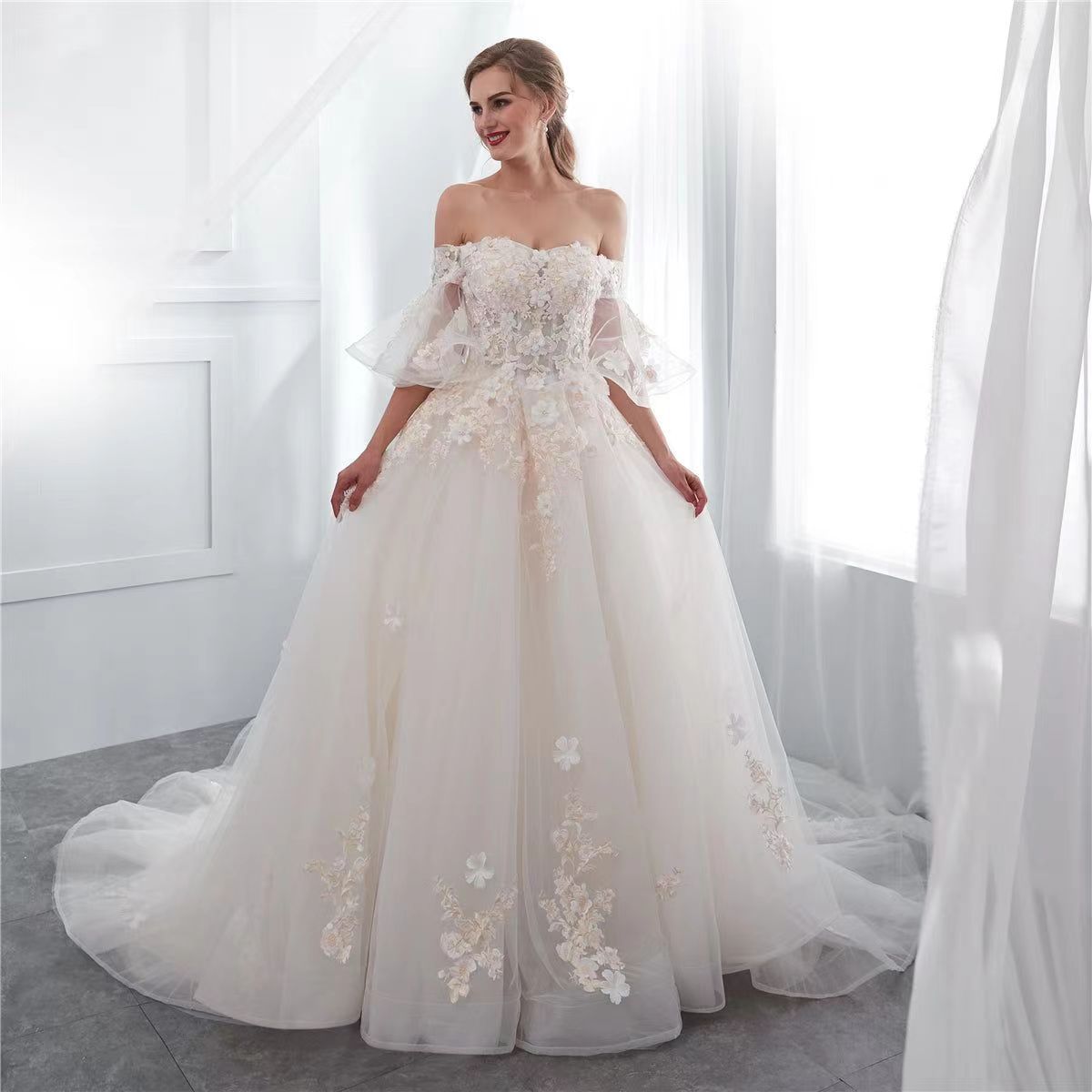 One shoulder wedding dress with back tie.