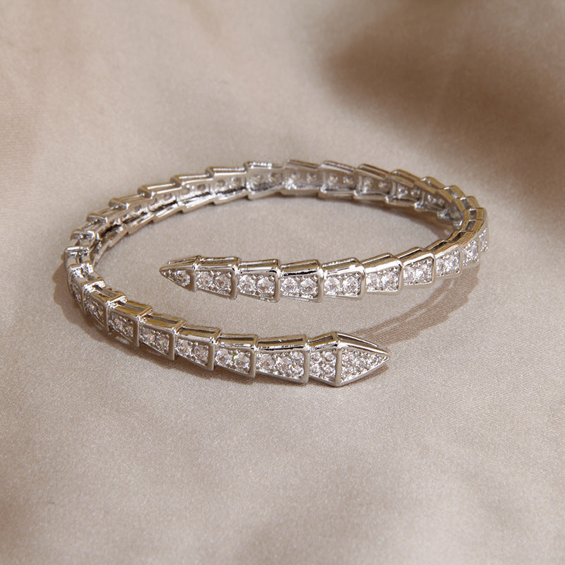 Serpent Splendor Crystal Coil Bangles
