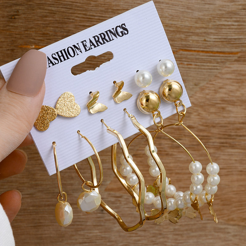 Pearl earring set with diamonds