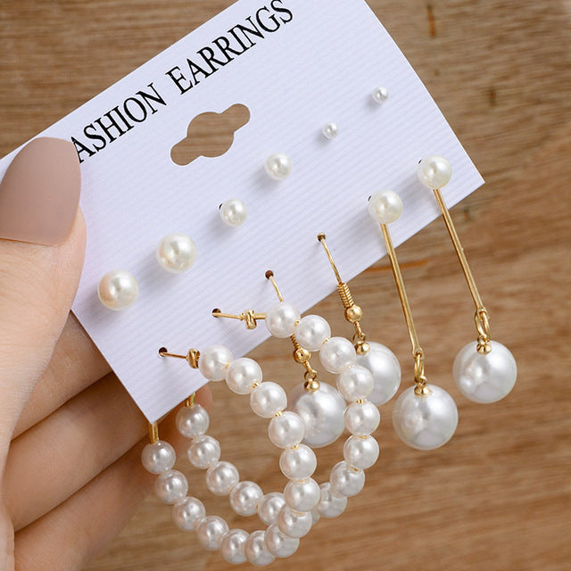 Pearl earring set with diamonds