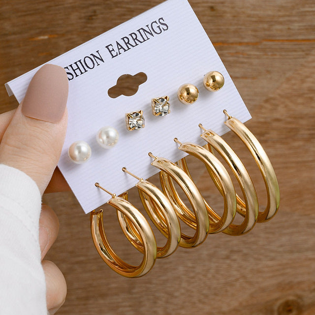 Pearl earring set with diamonds
