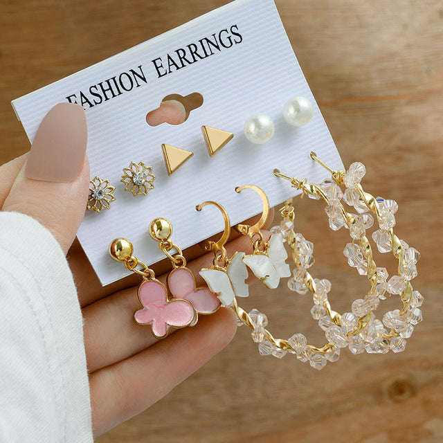 Pearl earring set with diamonds