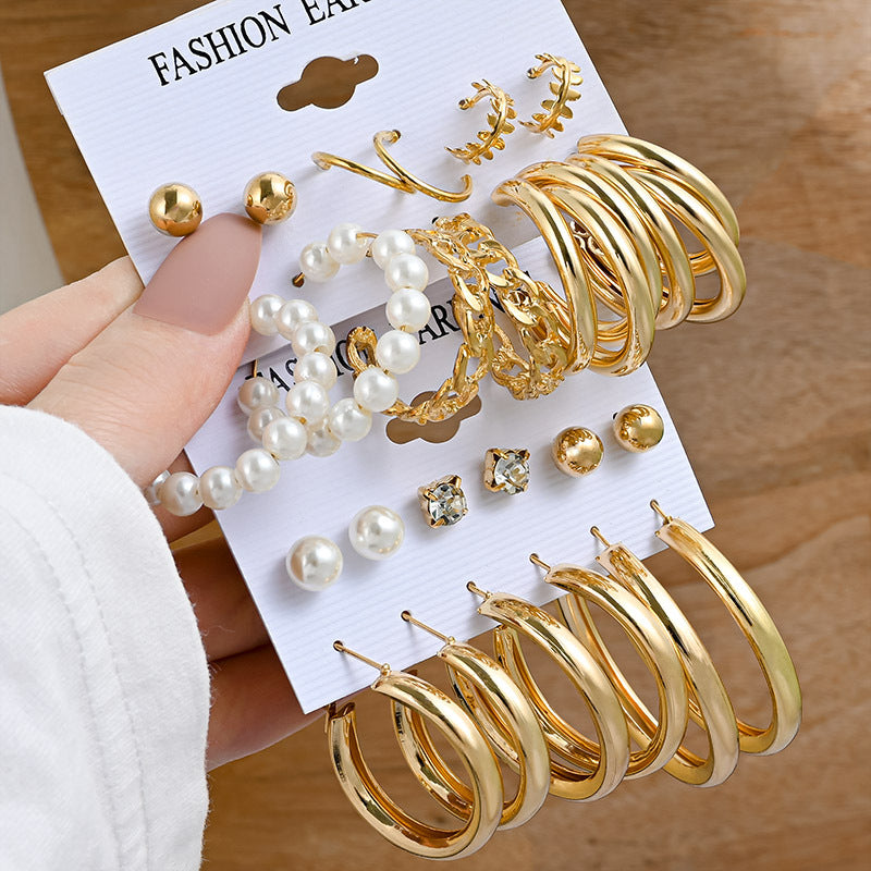 Pearl earring set with diamonds
