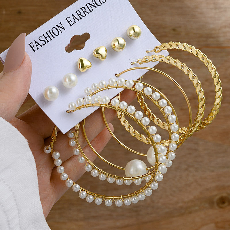 Pearl earring set with diamonds