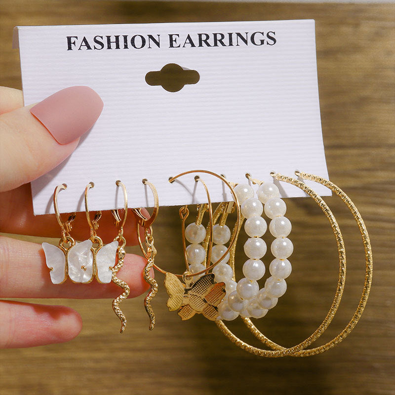 Pearl earring set with diamonds