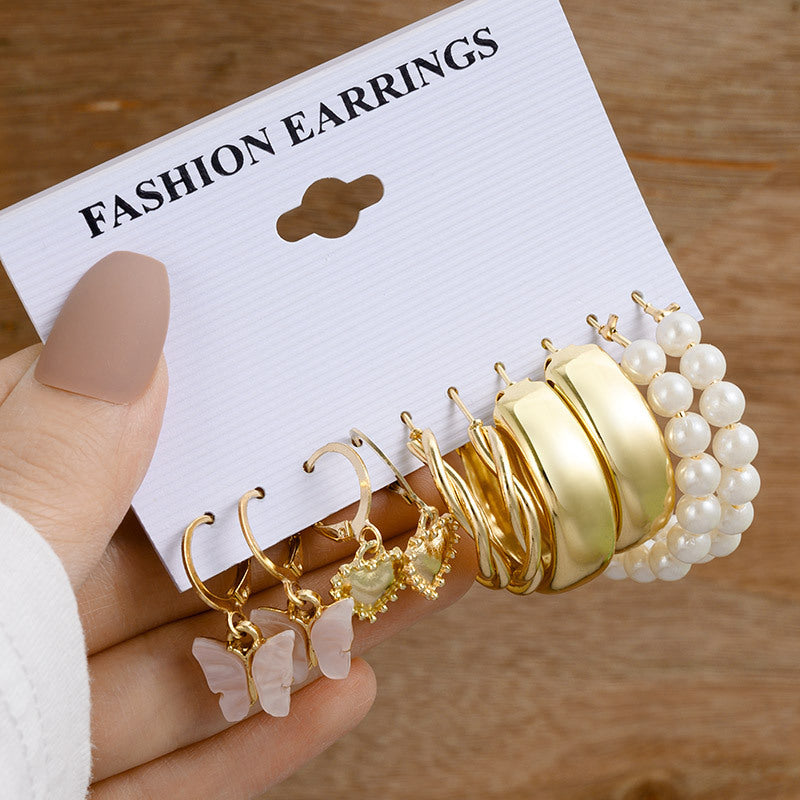 Pearl earring set with diamonds