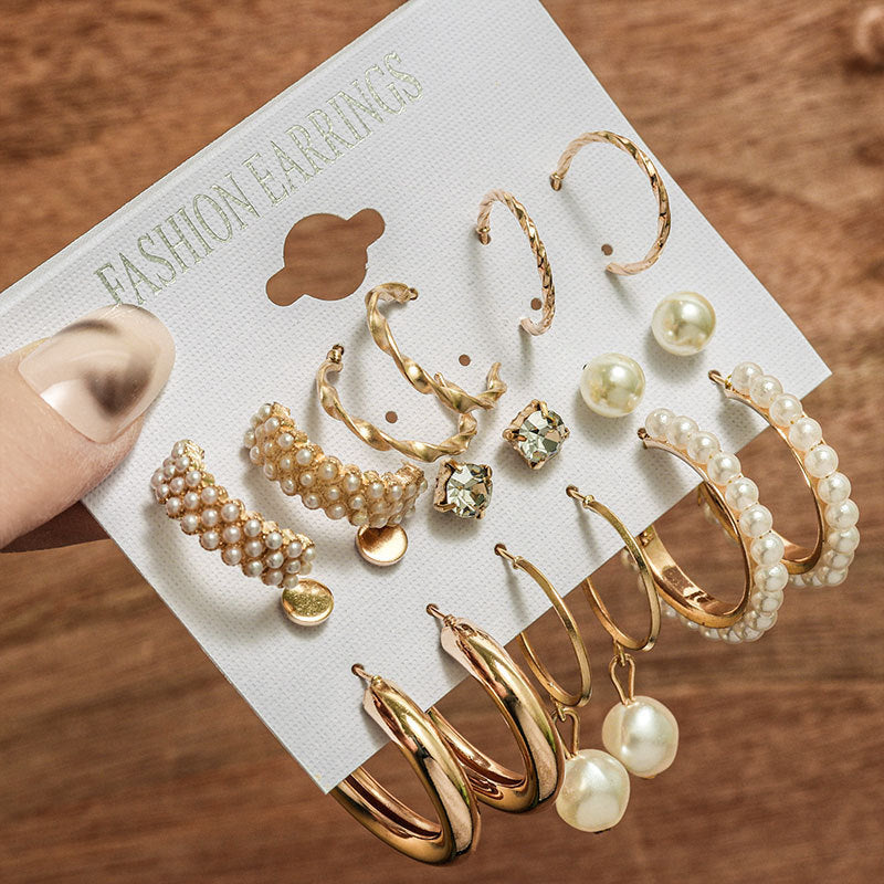 Pearl earring set with diamonds