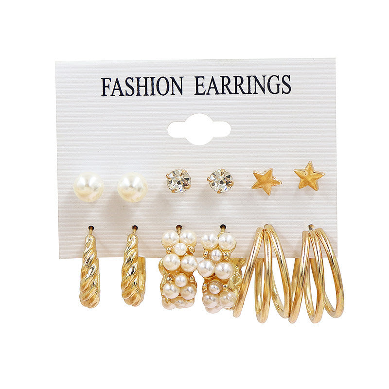 Pearl earring set with diamonds