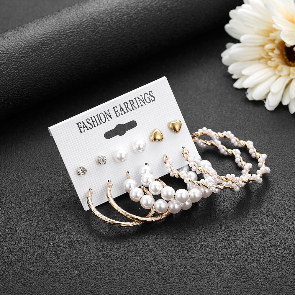 Pearl earring set with diamonds