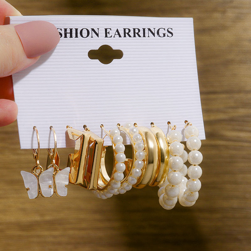 Pearl earring set with diamonds