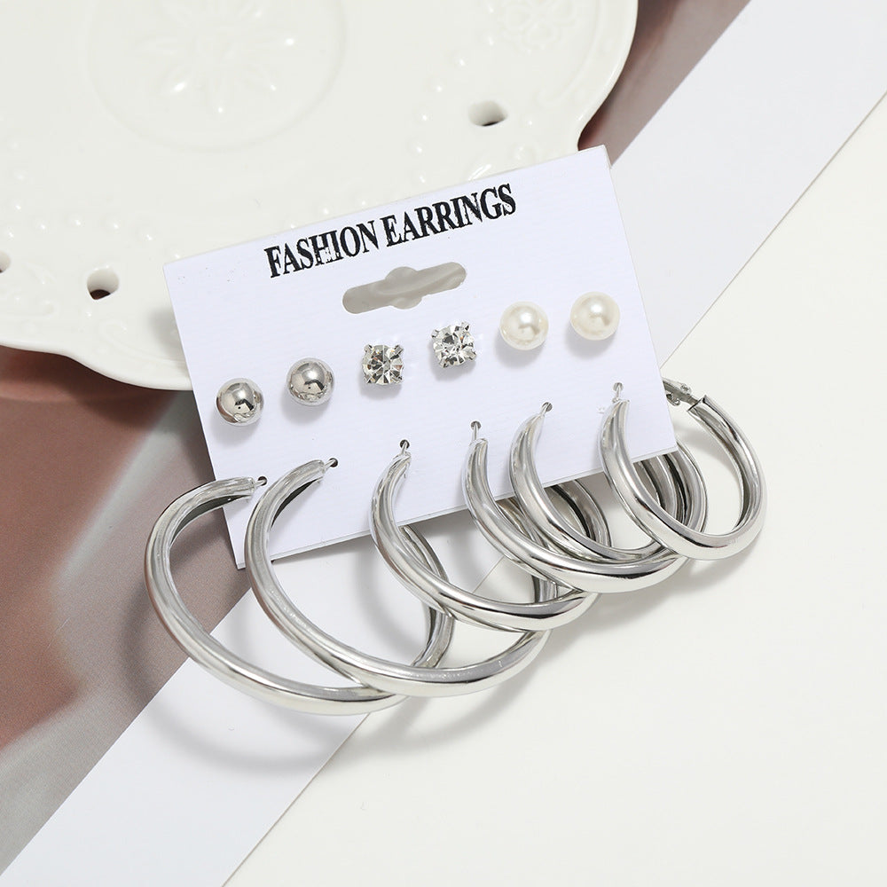 Pearl earring set with diamonds