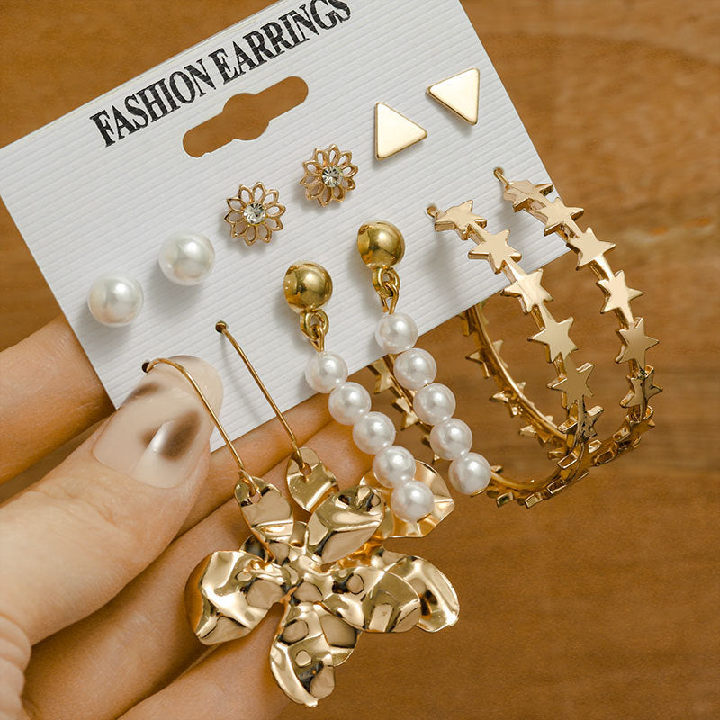 Pearl earring set with diamonds