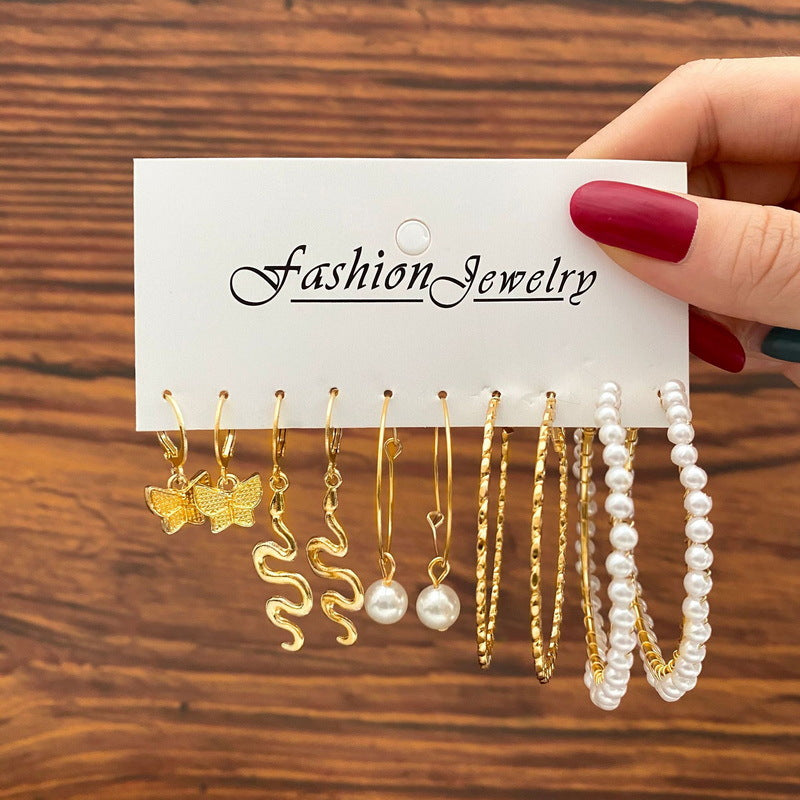 Pearl earring set with diamonds
