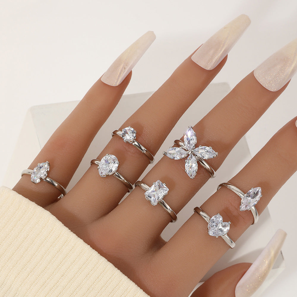 22-Piece Butterfly, Pearl, and Geometric Ring Set