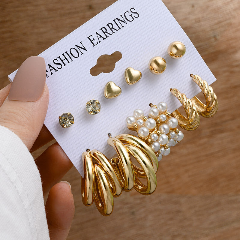 Pearl earring set with diamonds