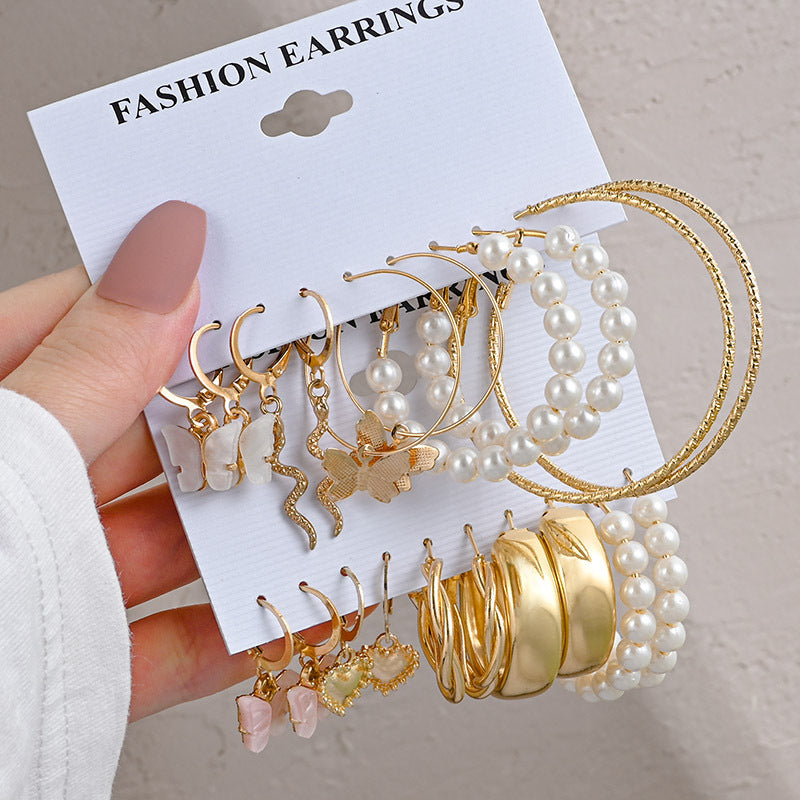 Pearl earring set with diamonds