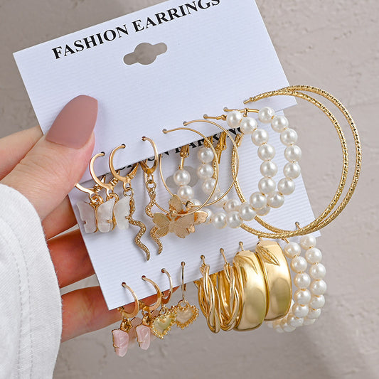 Pearl earring set with diamonds