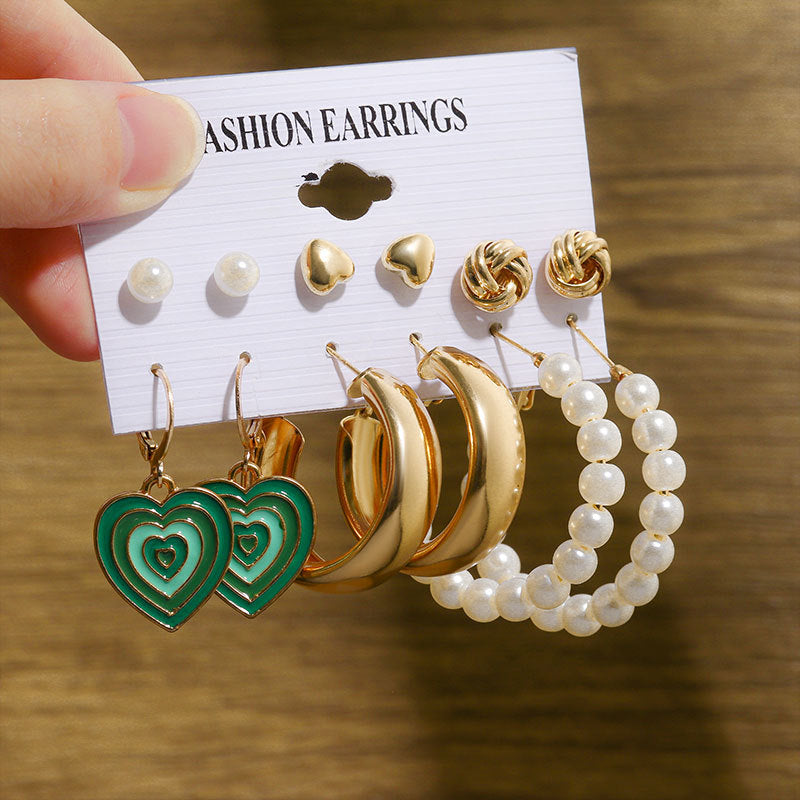 Pearl earring set with diamonds