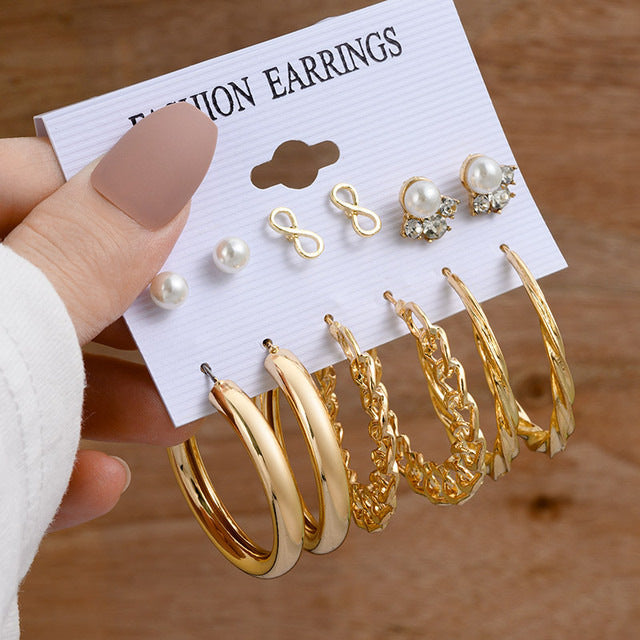 Pearl earring set with diamonds