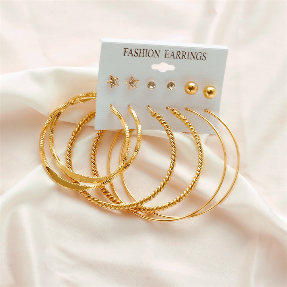 Pearl earring set with diamonds