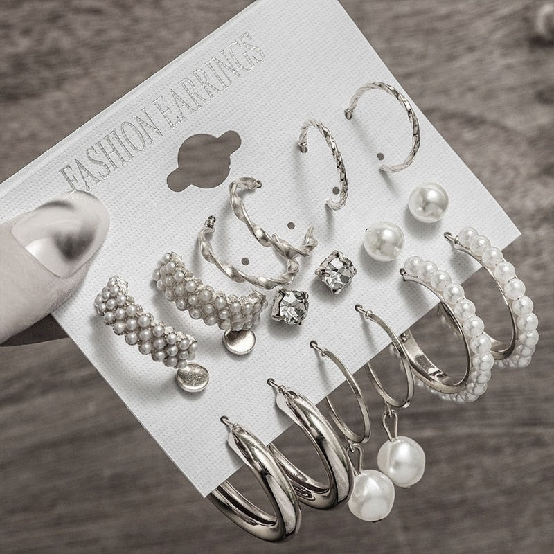 Pearl earring set with diamonds