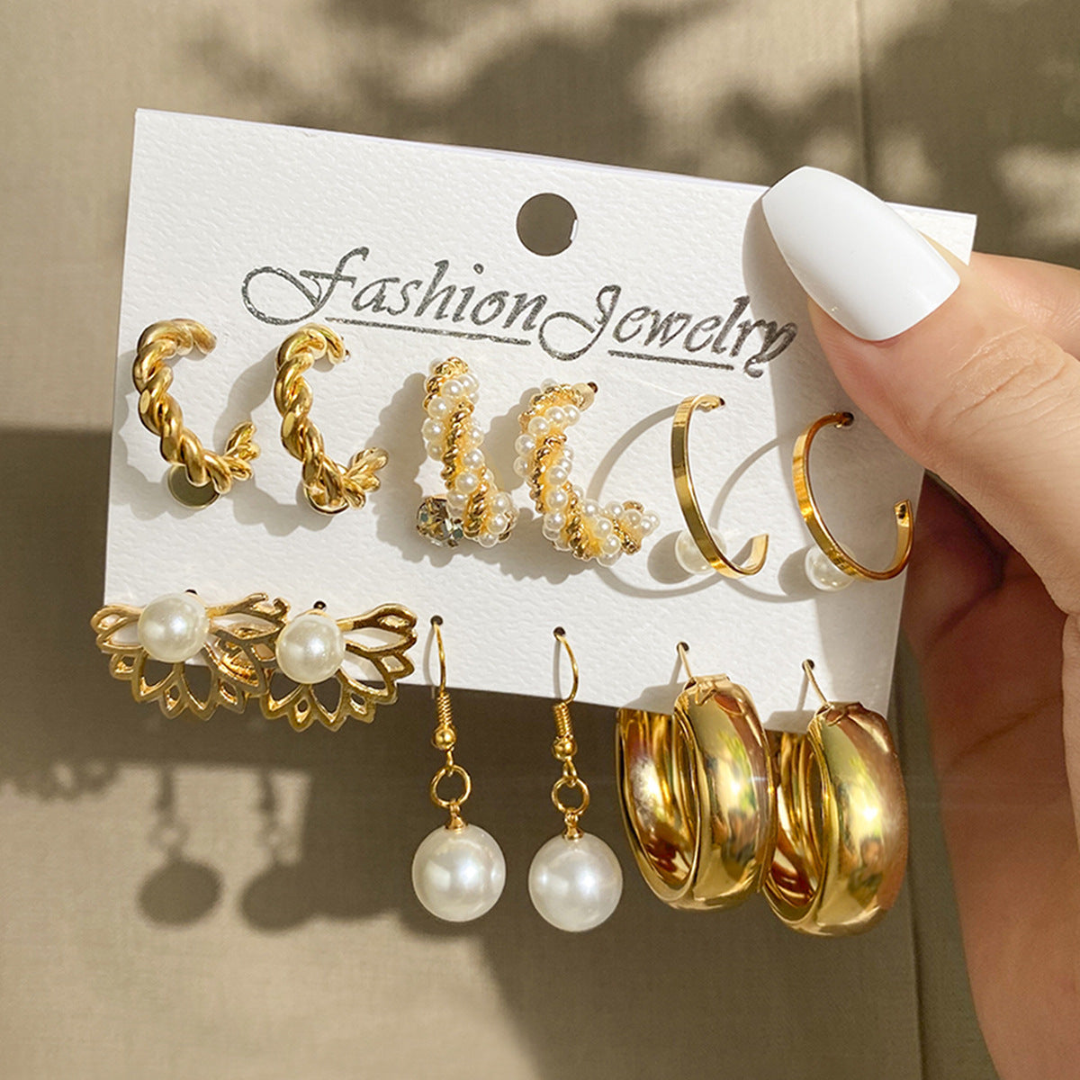 Pearl earring set with diamonds