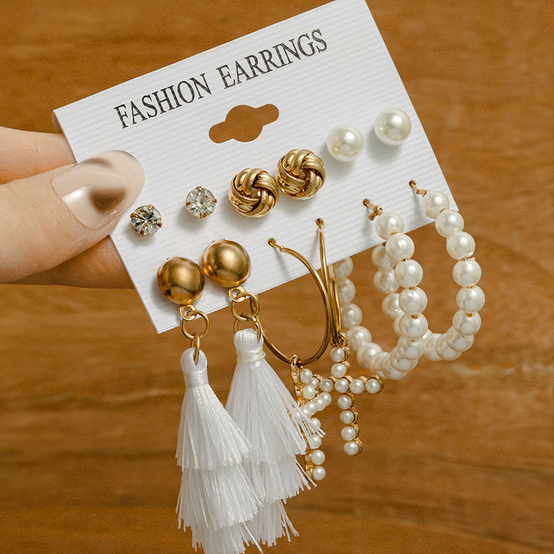 Pearl earring set with diamonds
