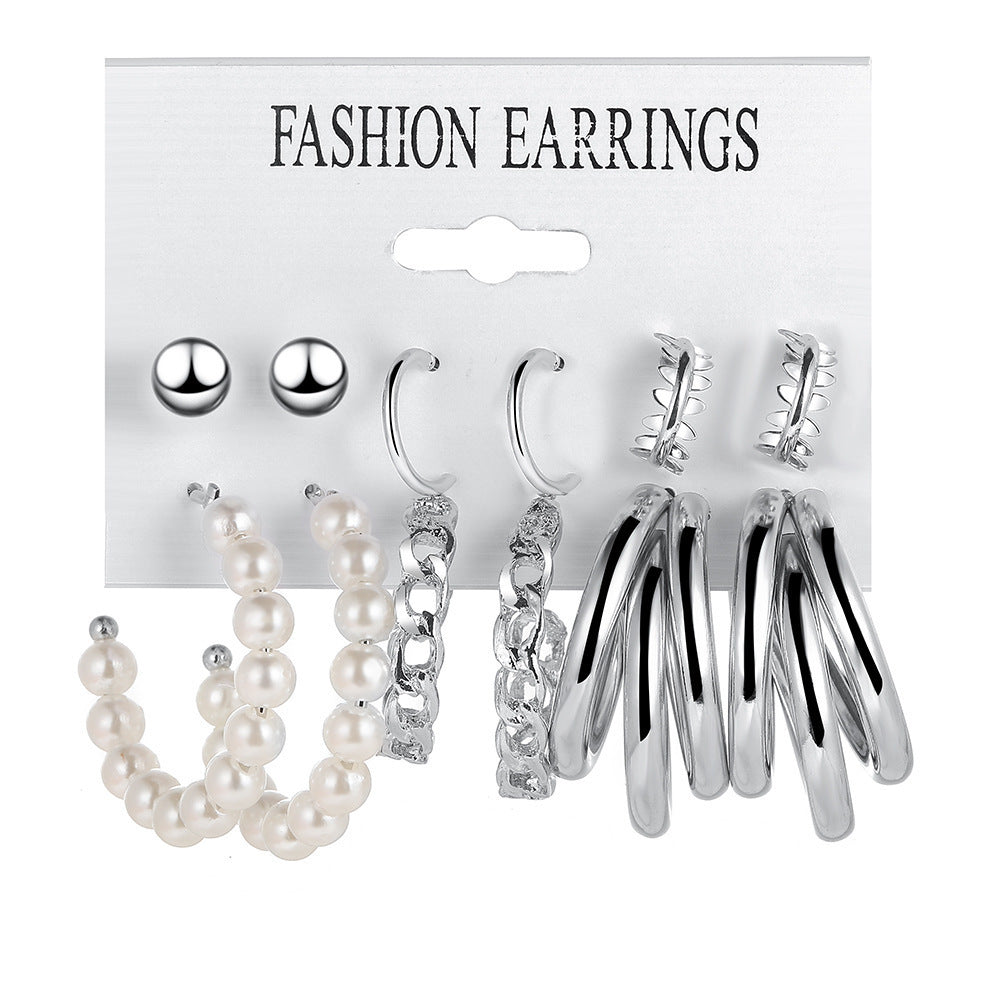 Pearl earring set with diamonds