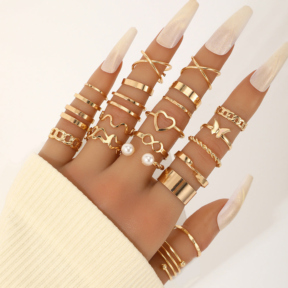 22-Piece Butterfly, Pearl, and Geometric Ring Set