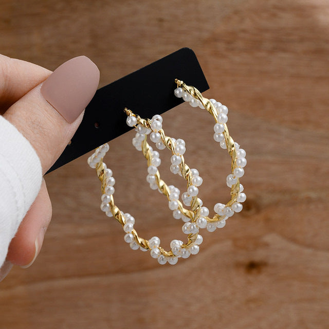 Pearl earring set with diamonds