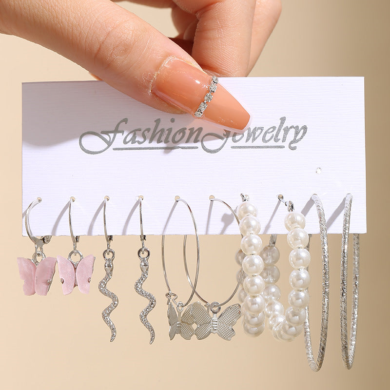 Pearl earring set with diamonds