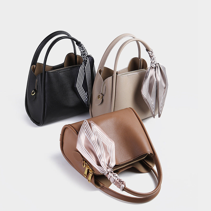 Mom's Essential: The New Bucket Handbag