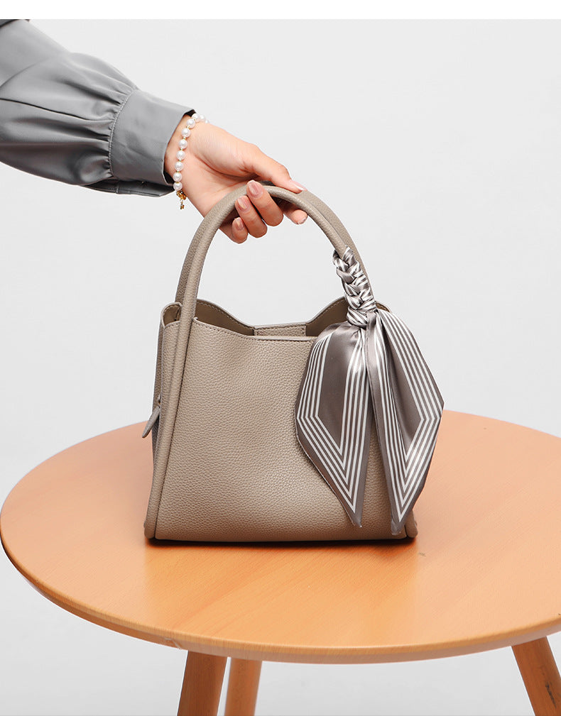 Mom's Essential: The New Bucket Handbag